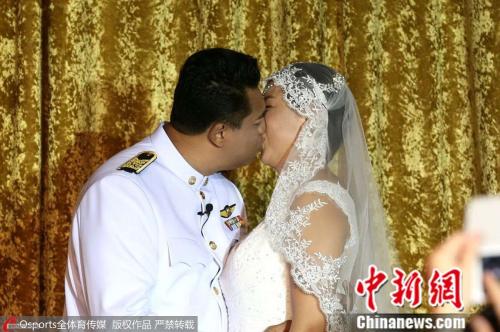 资料图：冯坤、加提蓬大婚。图片来源：Osports全体育图片社
